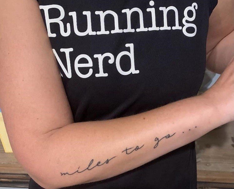 running mantra tattoo