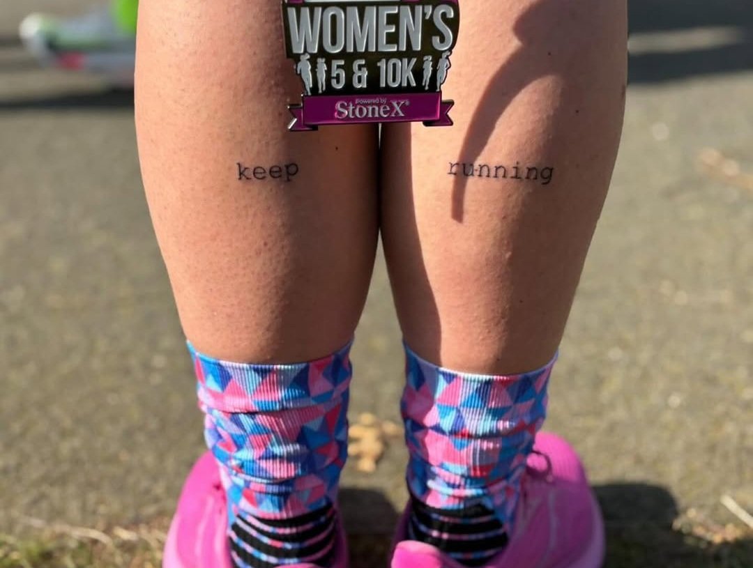 womens running tattoo