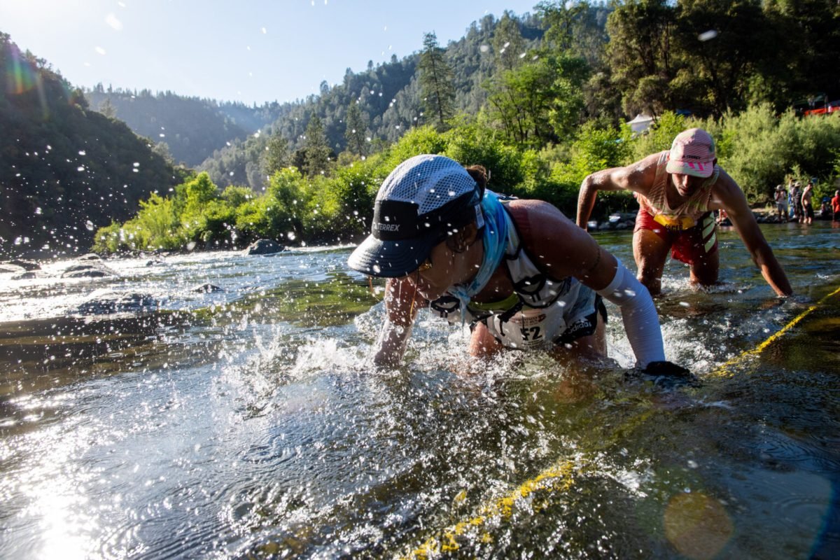ultramarathoners crossing the american river