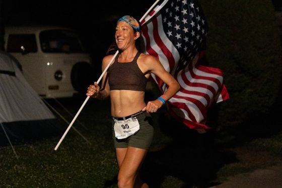 Megan Eckert 2025 six-day world record with flag
