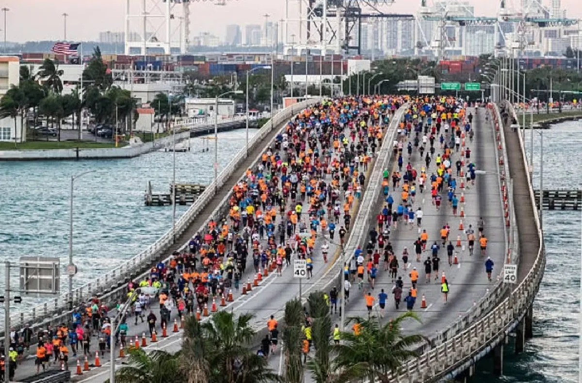 runners on causeway miami marathon florida